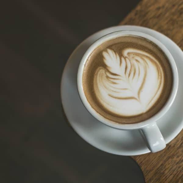 A latte in a ceramic cup